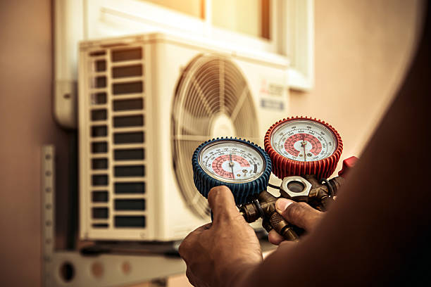 Professional Heat Pump Repair technician working in Amo, IN